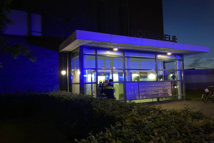 Brand in flat door wasmachine