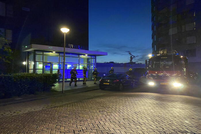 Brand in flat door wasmachine