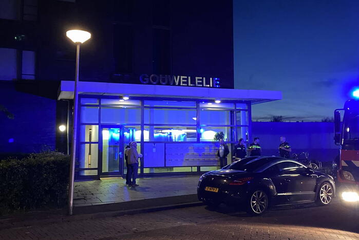 Brand in flat door wasmachine