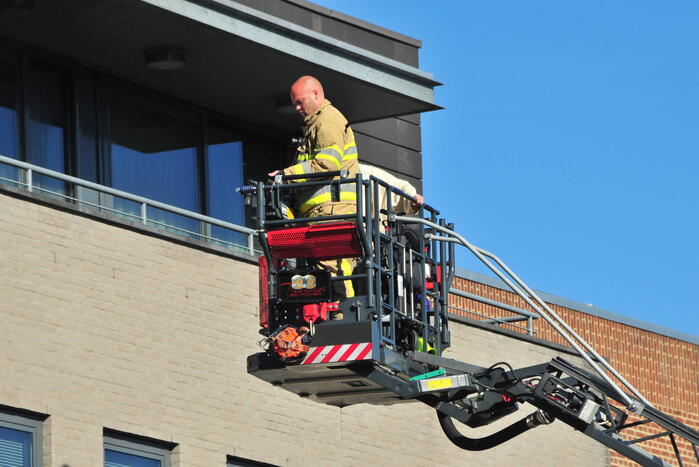 Personen uit brandende bovenwoning gered