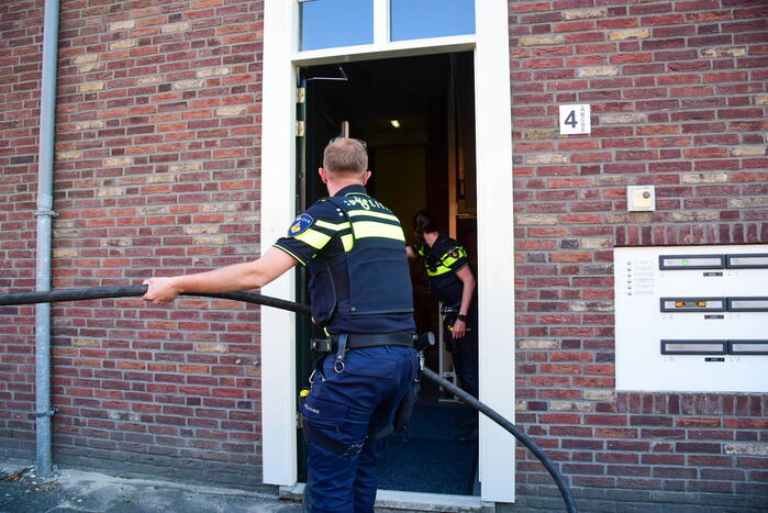 Brand in bloemenwinkel door onkruidverbranding