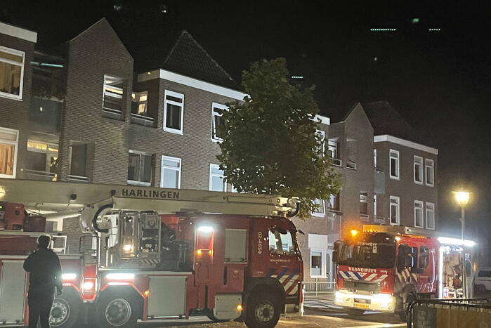 Forse rookontwikkeling bij brand in appartement