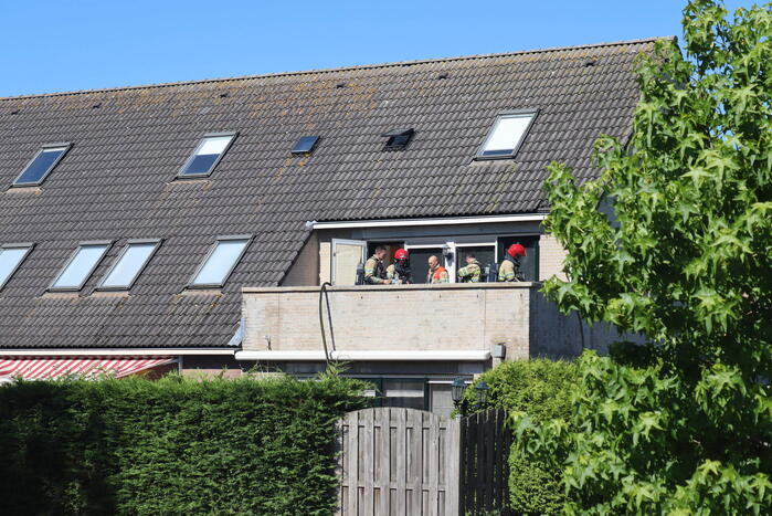 Brand op bovenste verdieping van hoekwoning