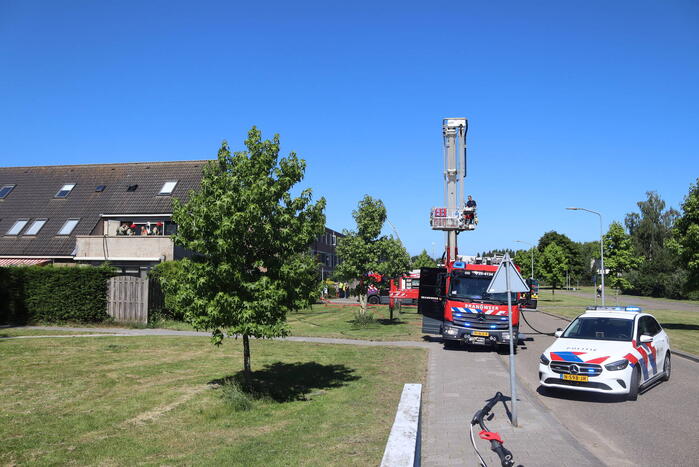 Brand op bovenste verdieping van hoekwoning