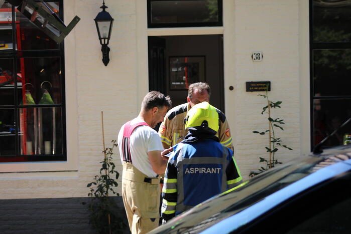 Brand in schuur tussen twee woningen