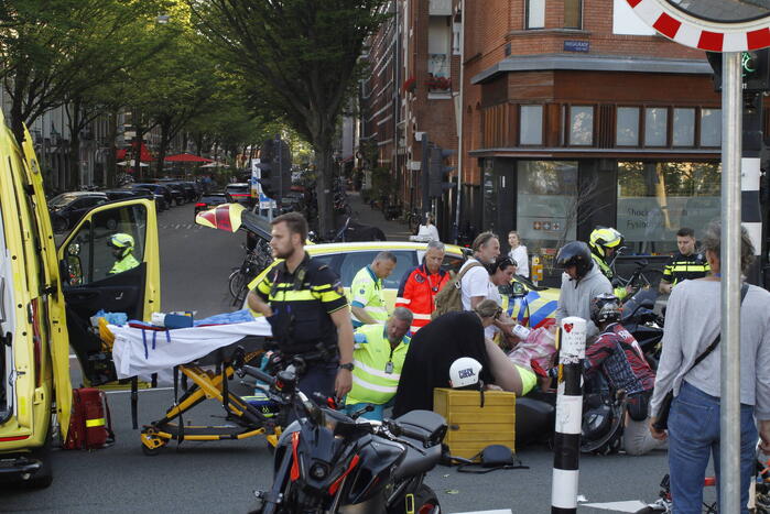 Persoon bekneld na ongeval met bezorgscooter