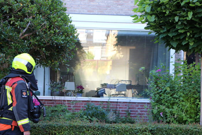 Persoon gewond bij woningbrand