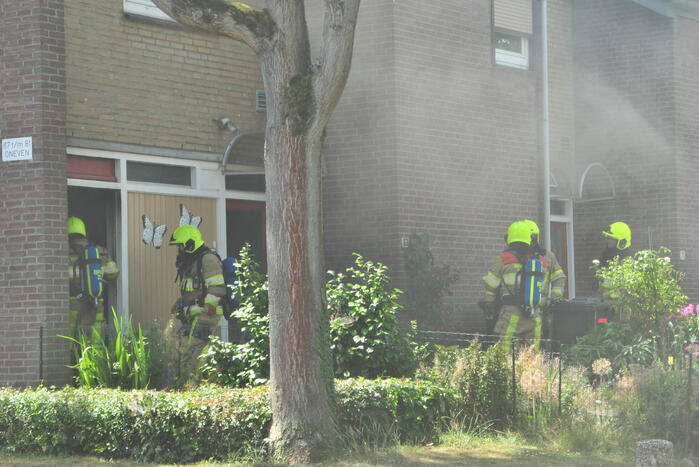 Rook bij brand in woning