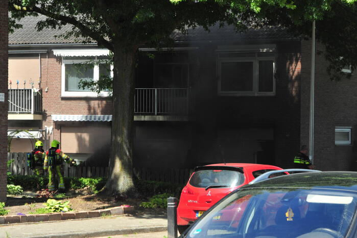 Rook bij brand in woning