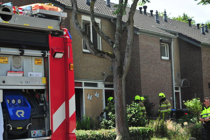 Rook bij brand in woning