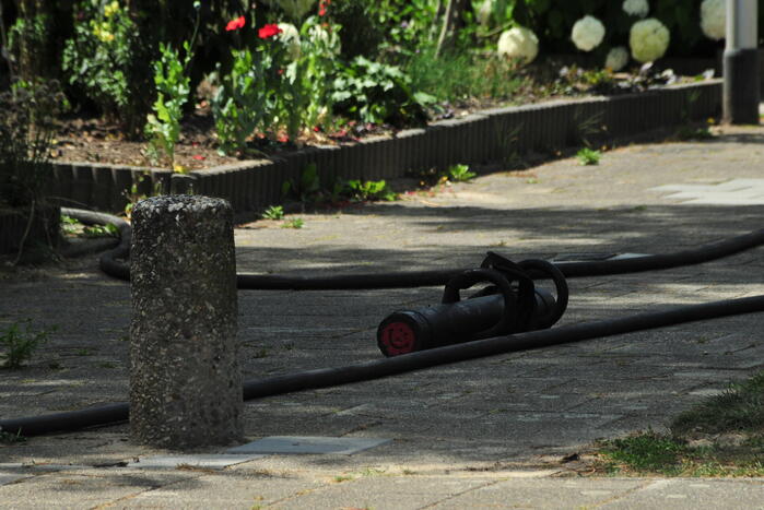 Rook bij brand in woning