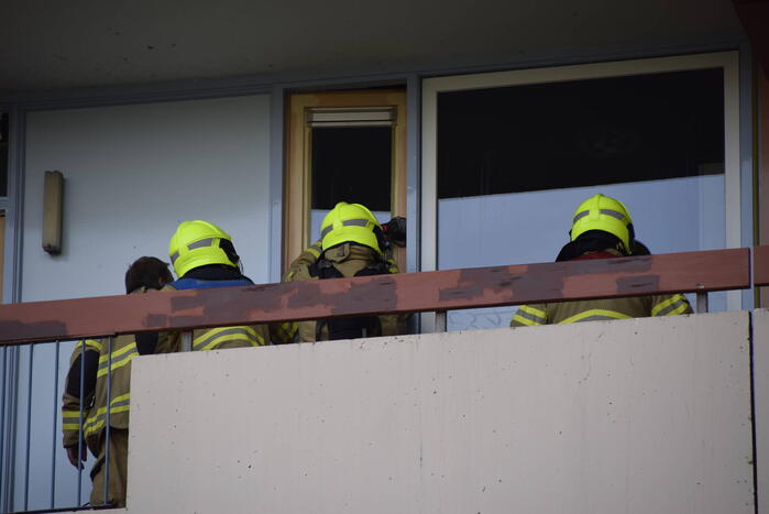 Bewoner sluit zichzelf buiten met eten nog in oven