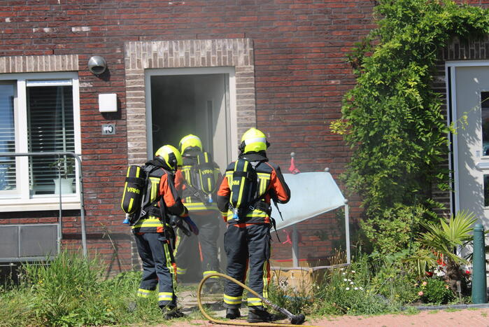 Veel rook bij brand in woning