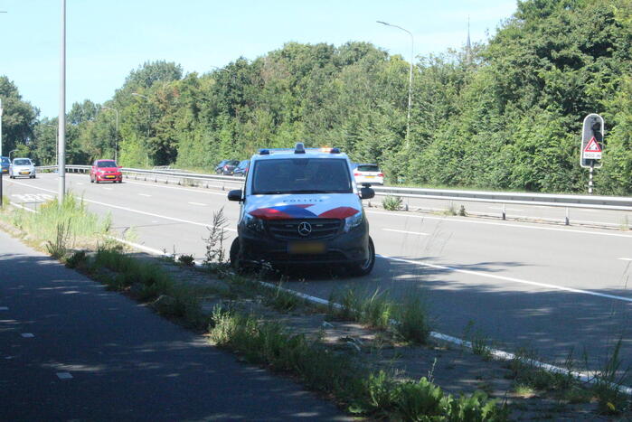 Vrouw onwel in personenauto