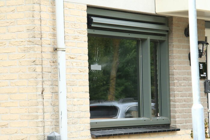 Politie doet onderzoek naar kogelgaten in woning