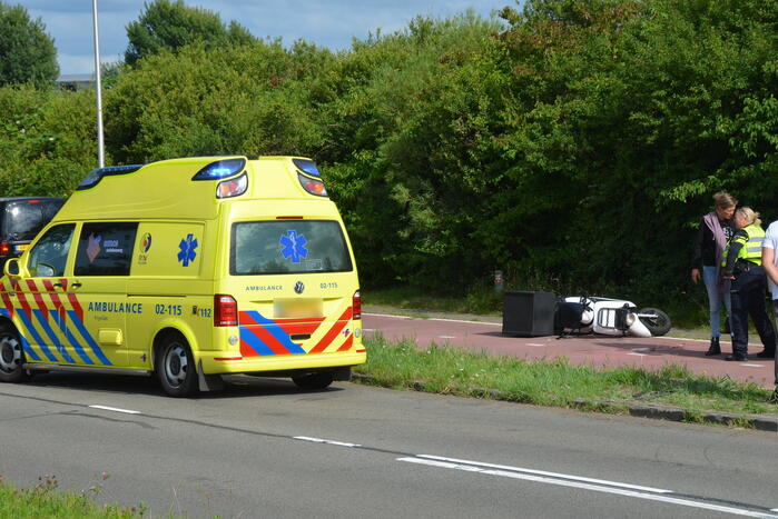 Scooterrijders in botsing op fietspad