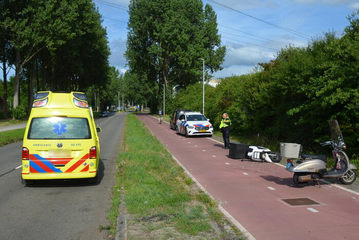 Scooterrijders in botsing op fietspad
