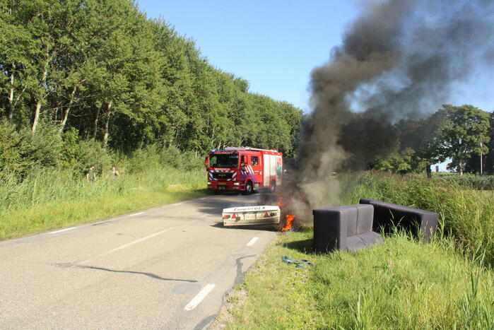 Vouwwagen vat vlam tijdens rijden