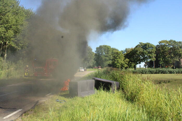 Vouwwagen vat vlam tijdens rijden