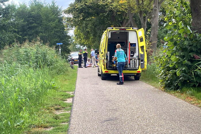 Fietser gevallen op asfalt