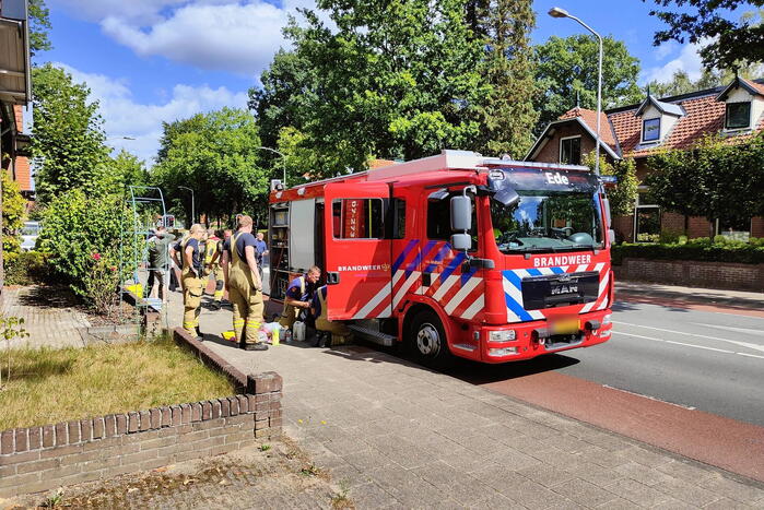 Brandweerwagen onderweg naar brand in botsing met auto