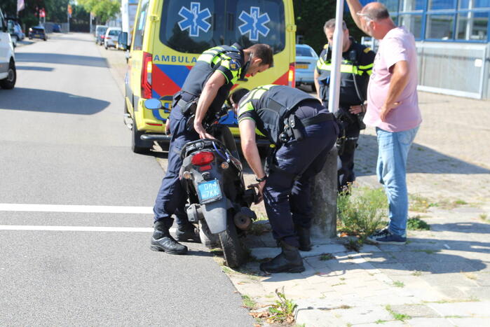 Scooterrijder aangereden door bestelbus