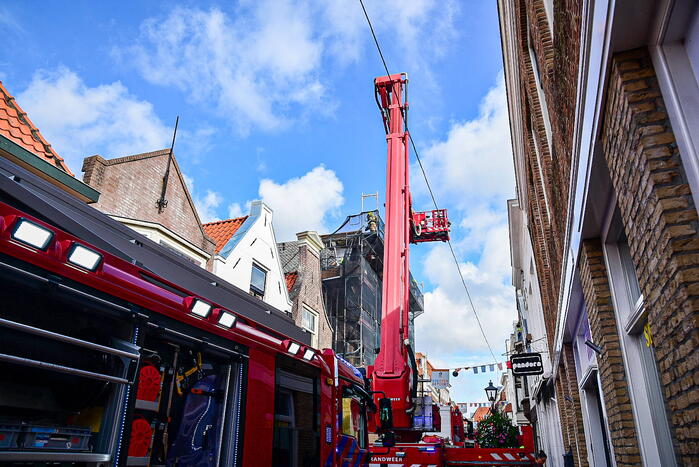 Veel schade na uitslaande brand op dak kerk