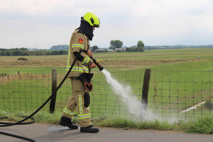 Afrastering beschadigd vanwege brand
