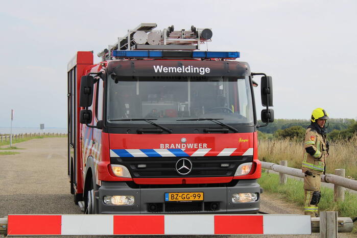Afrastering beschadigd vanwege brand