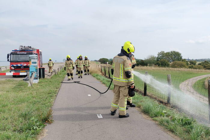 Afrastering beschadigd vanwege brand