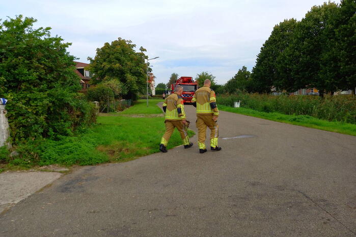 Brandweer blust brand in gebouw