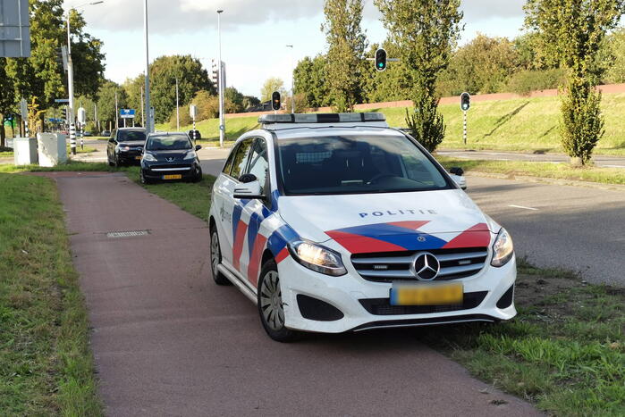 Schade bij botsing tussen drie auto's