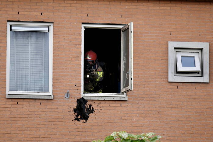 Flinke rookontwikkeling bij brand in woning