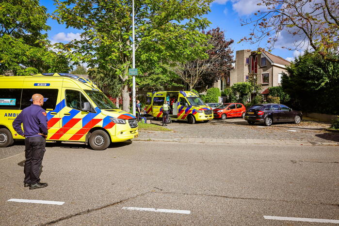 Persoon onwel tijdens snoeien van heg