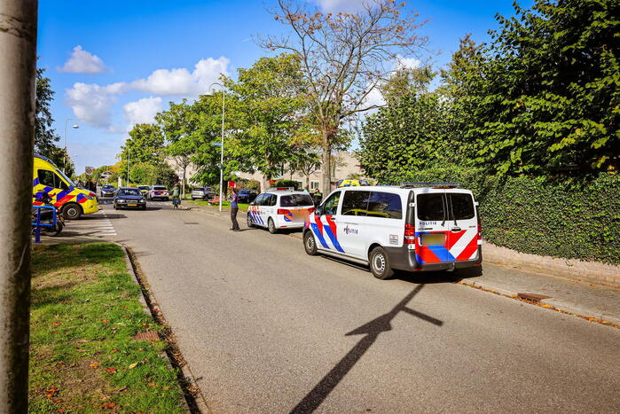 Persoon onwel tijdens snoeien van heg