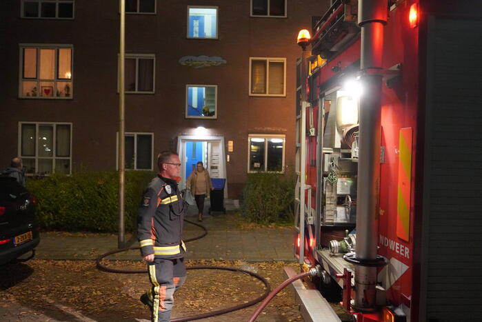 Bewoner gered na brand op tweede etage