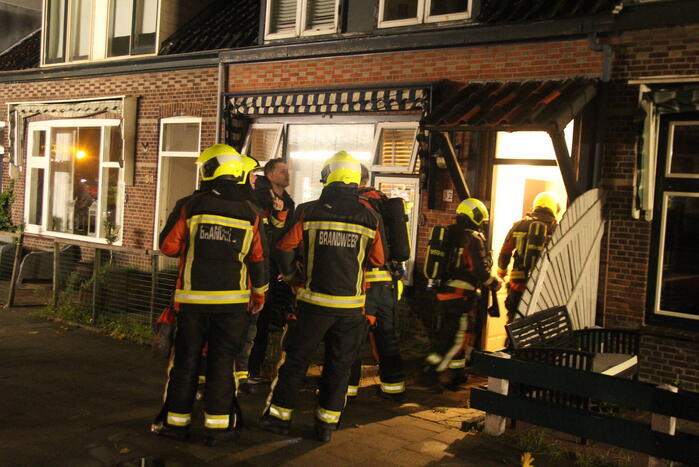 Brand in schoorsteen van woning