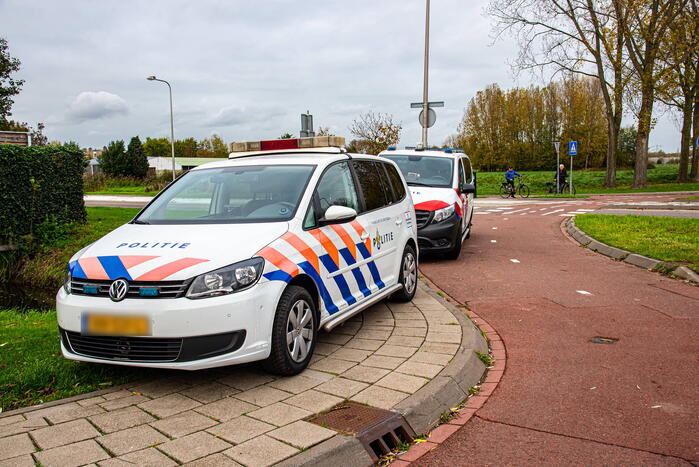 Vrouw met scootmobiel te water geraakt