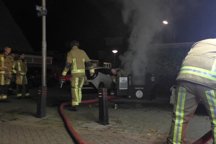 Veel rookontwikkeling bij brand in container