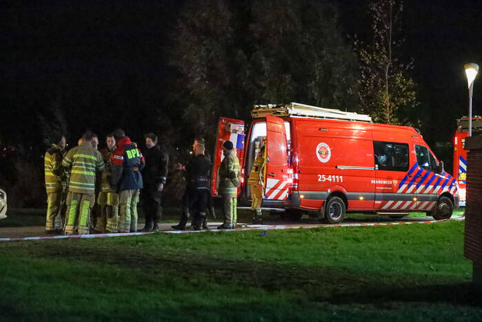 Persoon te water bij Albert Heijn supermarkt
