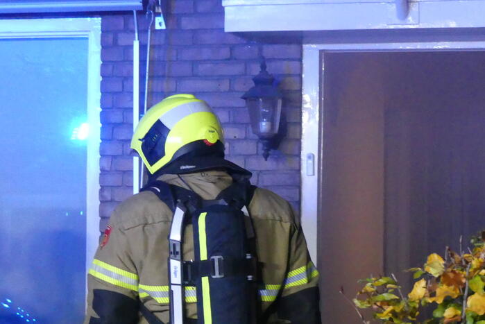 Persoon gewond bij woningbrand