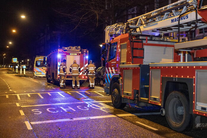 Stoel in woning vliegt in brand