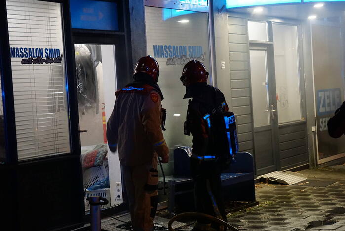 Veel rookontwikkeling bij brand in wasserette