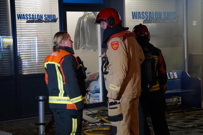 Veel rookontwikkeling bij brand in wasserette