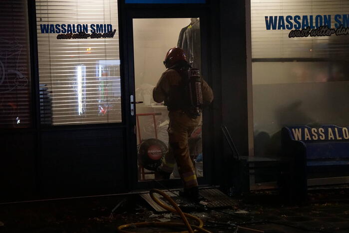 Veel rookontwikkeling bij brand in wasserette