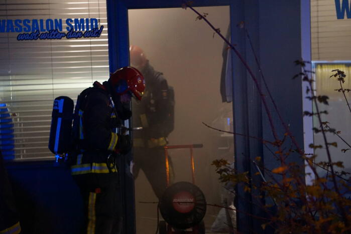 Veel rookontwikkeling bij brand in wasserette