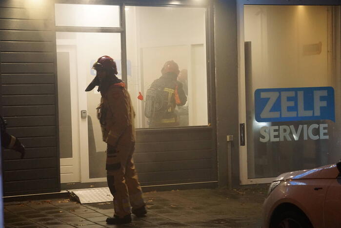 Veel rookontwikkeling bij brand in wasserette