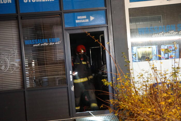 Veel rookontwikkeling bij brand in wasserette