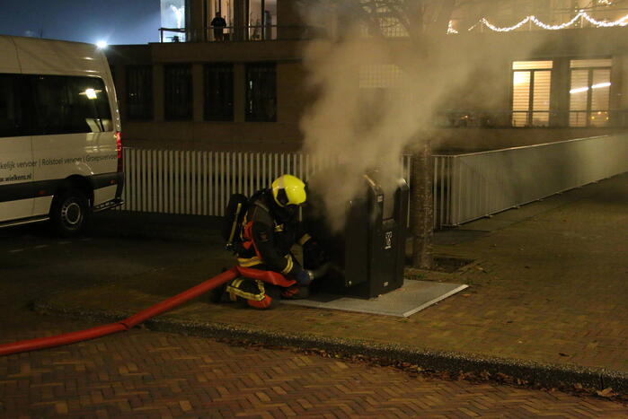 Ondergrondse container vermoedelijk in brand gestoken