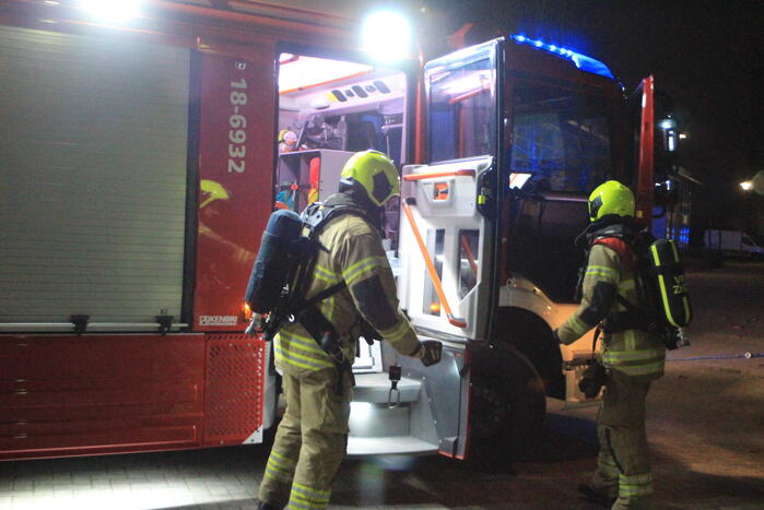 Brand in container tegen pand